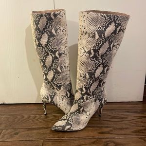 Steven Madden knew high heeled snakeskin boots